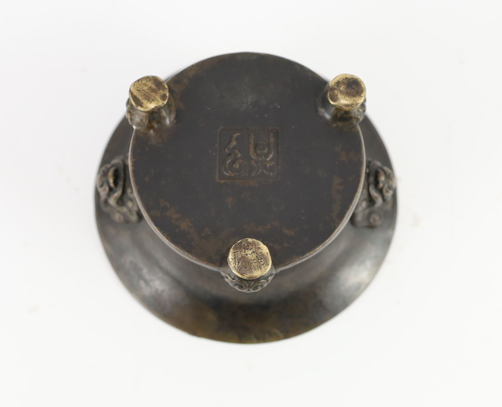 A Chinese bronze tripod censer, 18th century, 12.5 cm diameter